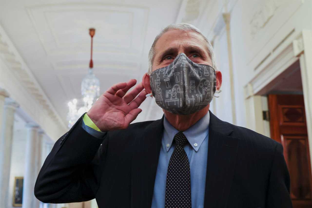 Fauci says you may have to wear TWO MASKS and warns you aren’t safe from new Covid strains even if you’ve been sick