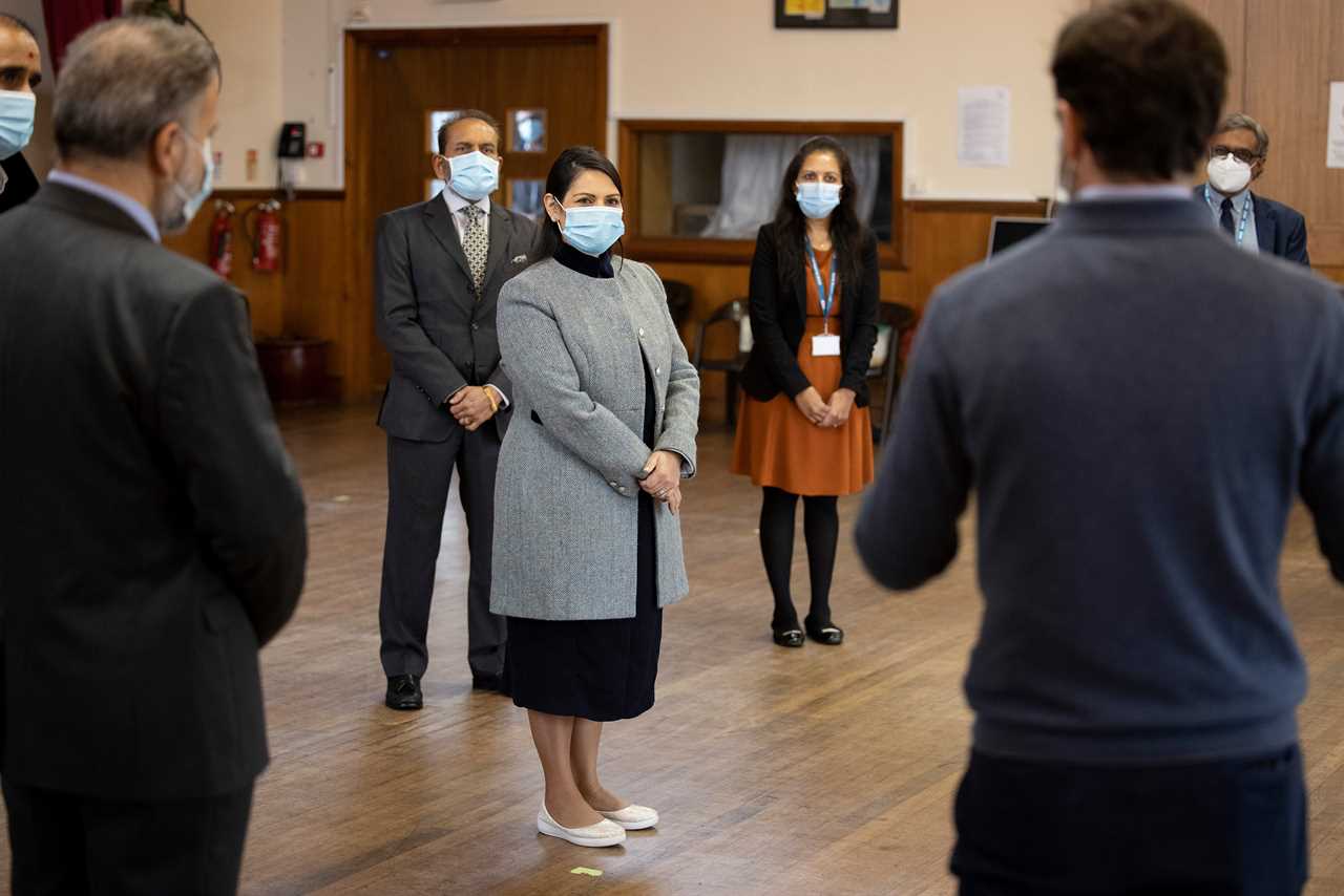 Priti Patel urges ethnic minority Brits to get ‘life saving’ Covid vaccine after her parents receive jab