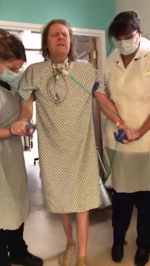 Incredible moment one of UK’s longest-suffering Covid patients, 49, walks for first time since March