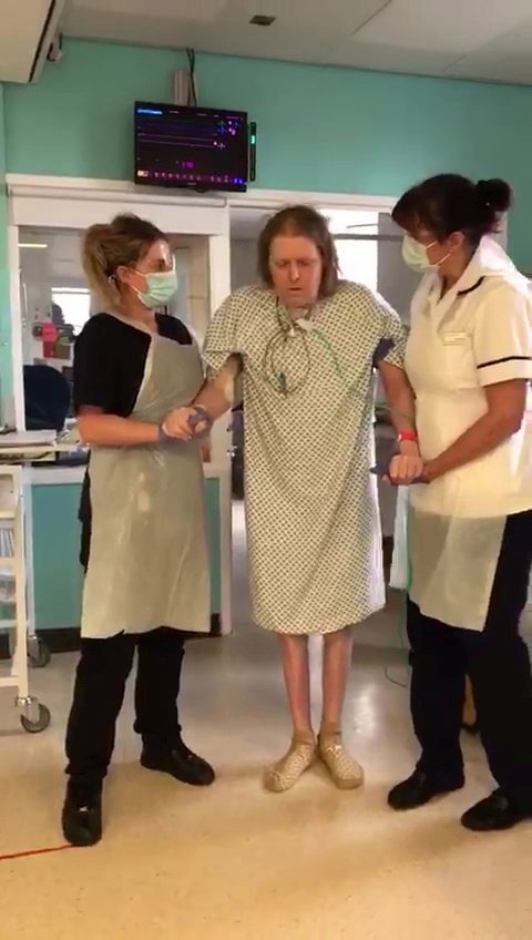 Incredible moment one of UK’s longest-suffering Covid patients, 49, walks for first time since March