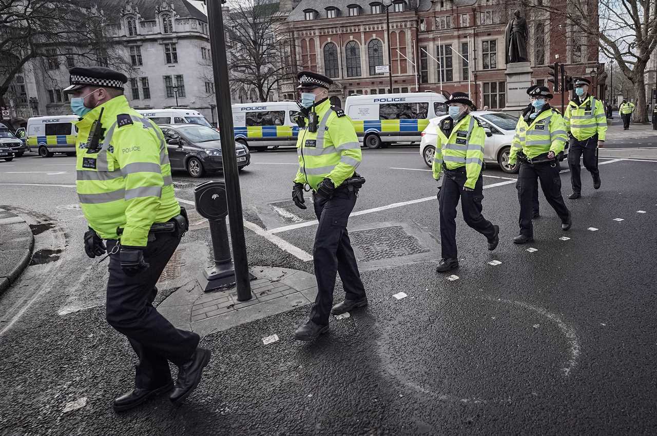 Police told NOT to wear uniform at Covid vaccine centres ‘to avoid drawing attention’ while receiving leftover jabs