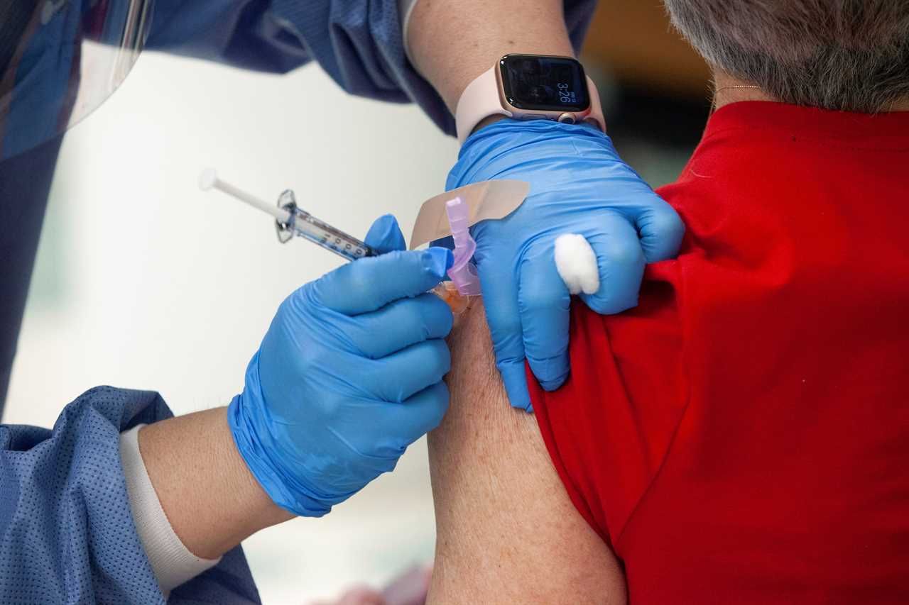 Four people get Covid 14 days AFTER being fully vaccinated as officials says jab ‘reduced the severity’ of sickness