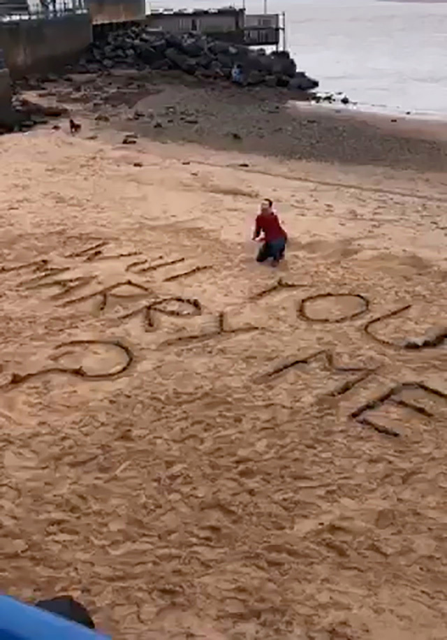 Romantic proposed by writing ‘Will you marry me?’ on his local beach after Covid wrecked plan to pop question in Italy