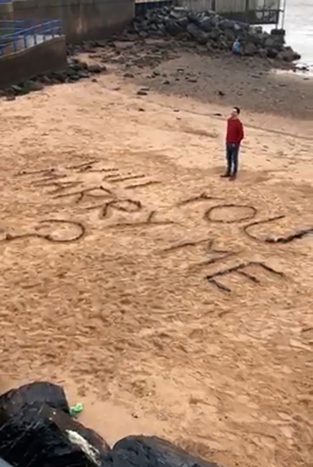 Romantic proposed by writing ‘Will you marry me?’ on his local beach after Covid wrecked plan to pop question in Italy