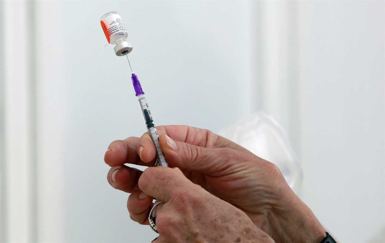 Pfizer says South Africa Covid variant could reduce vaccine protection by TWO-THIRDS as it rushes to produce updated jab