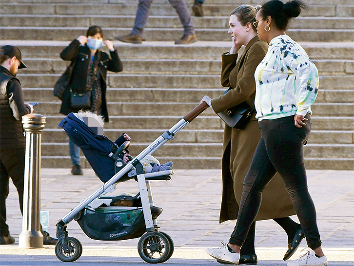 Boris Johnson’s son Wilf has inherited his father’s infamous wild hairdo – which spills over the top of his pushchair