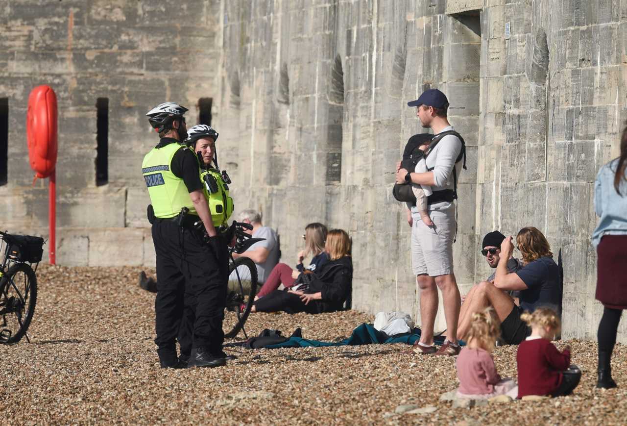 Cops no longer breaking up outdoor group mixing as they slam ‘unmanageable’ Covid rules after sunny crowds