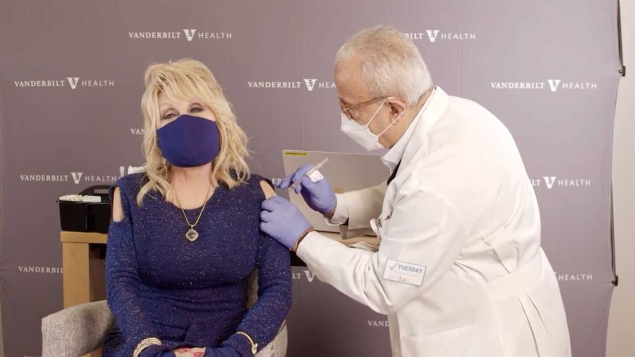 Dolly Parton receives Covid-19 vaccine and encourages others to get it as she says ‘don’t be such a chicken!’