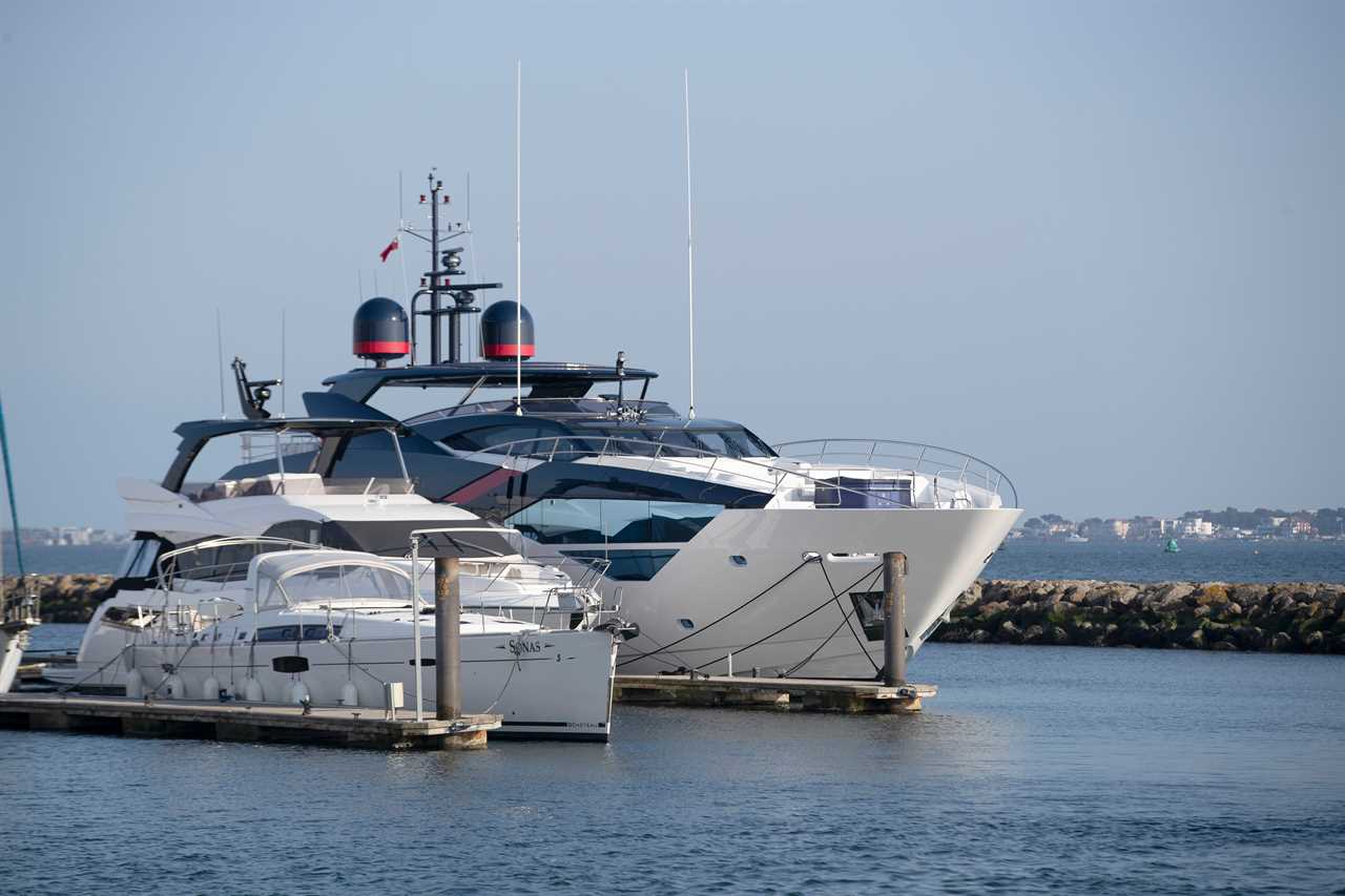 Three superyachts worth a combined £150million arrive in Dorset harbour to see out the pandemic