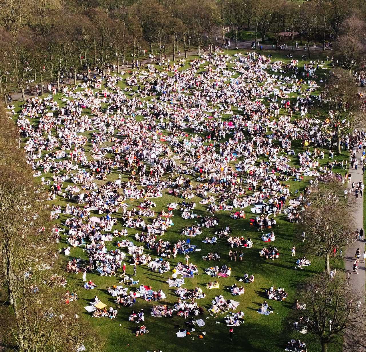 Lockdown extension fears as Brits pack parks and beaches for 24C mini-heatwave and experts warn of infections spike