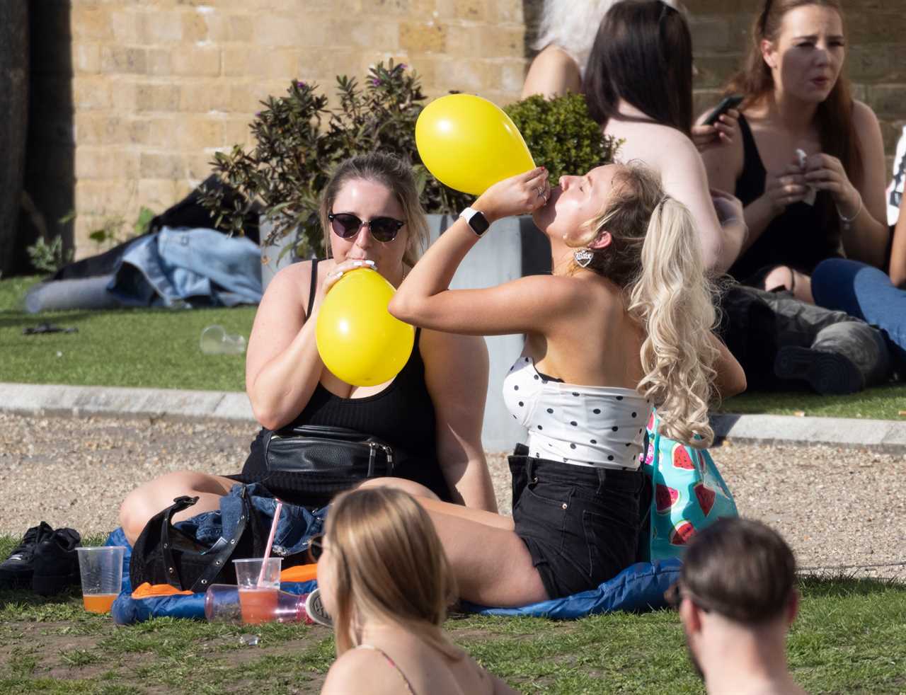 Lockdown extension fears as Brits pack parks and beaches for 24C mini-heatwave and experts warn of infections spike