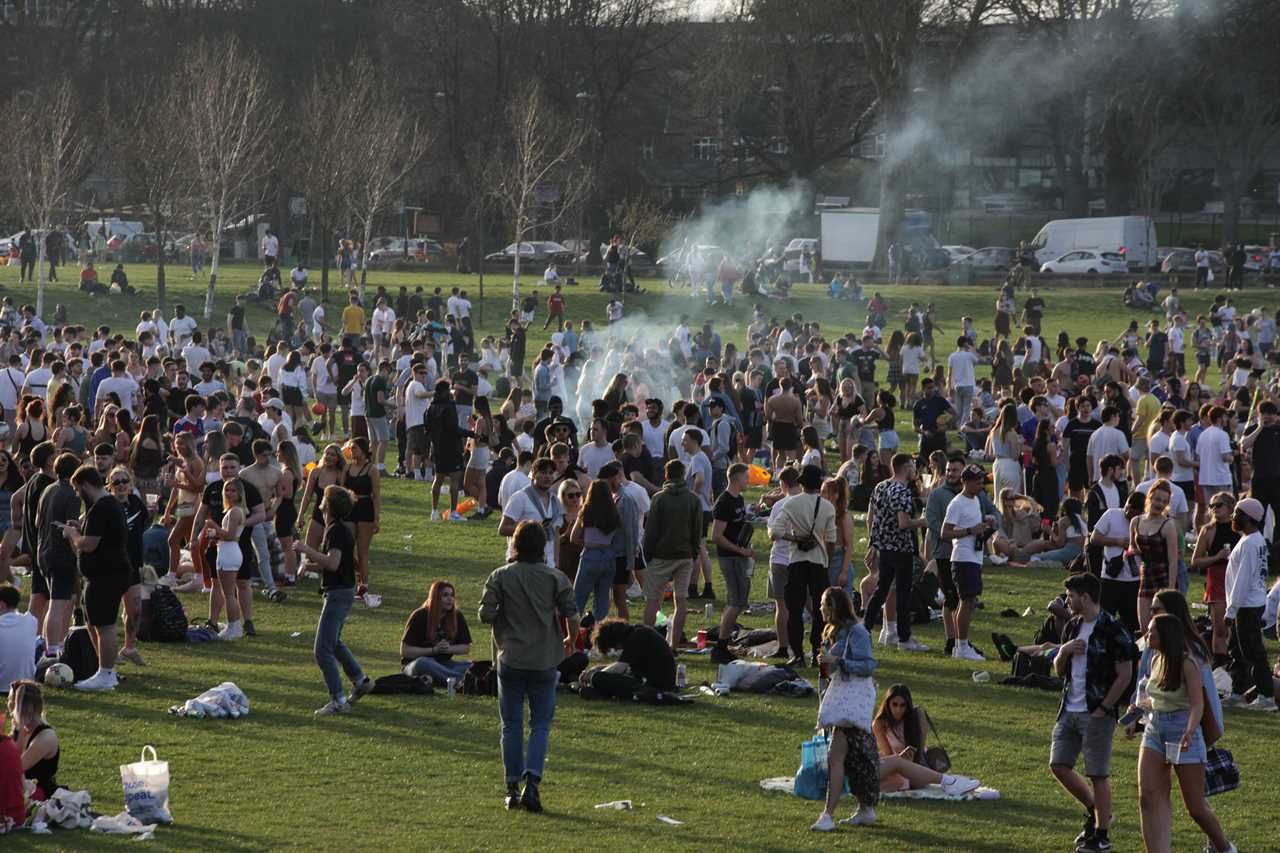 Lockdown extension fears as Brits pack parks and beaches for 24C mini-heatwave and experts warn of infections spike