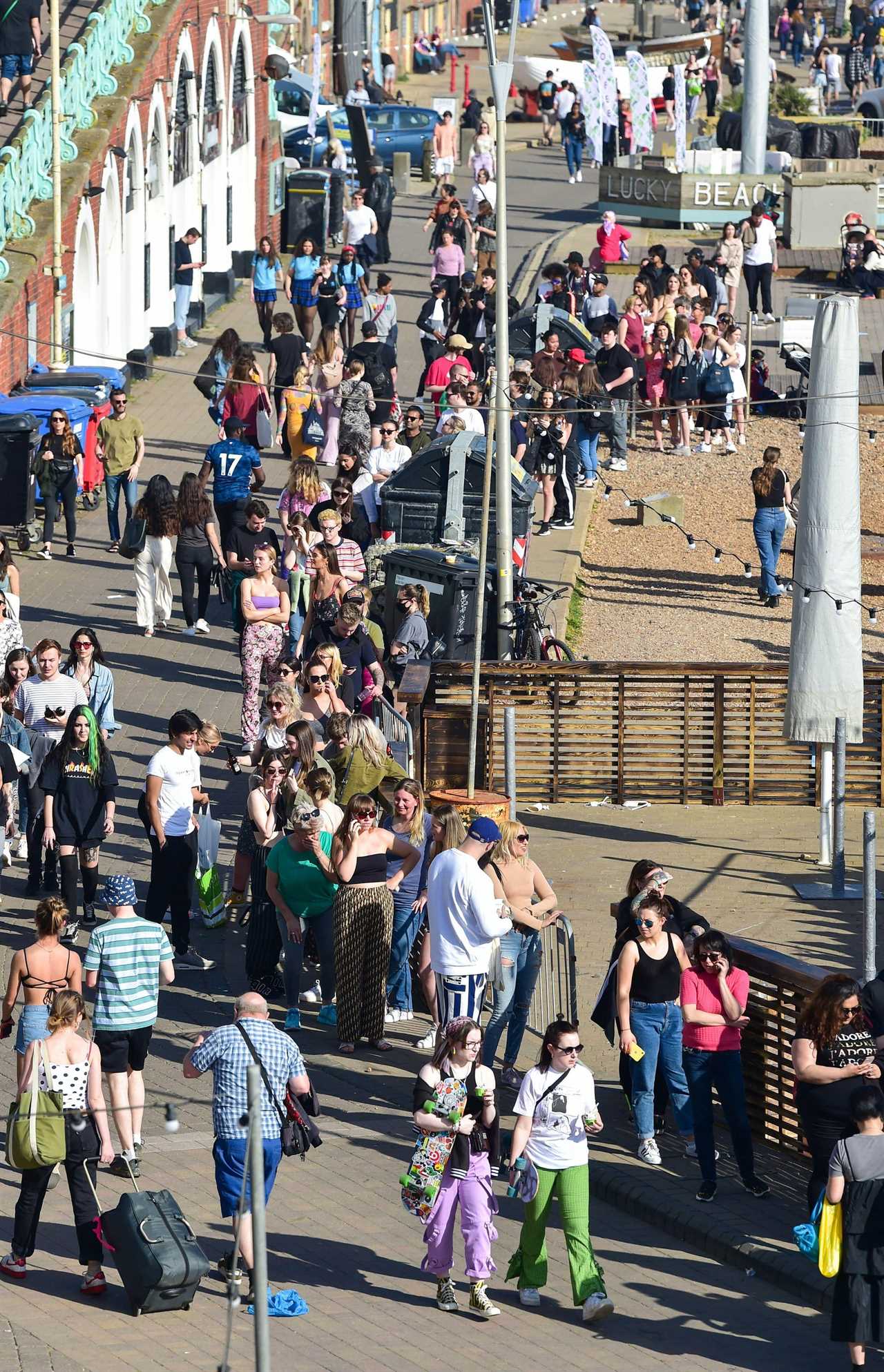 The queue for the public toilets stretches out along the Brighton seafront