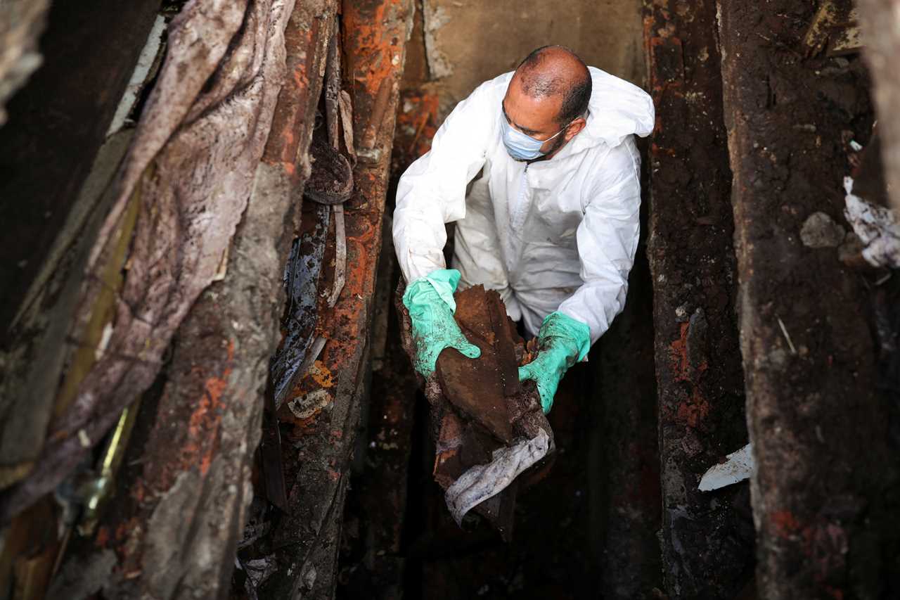 Overflowing Brazil cemetery digs up 1,000 skeletons to make room for more Covid victims as deaths spiral out of control