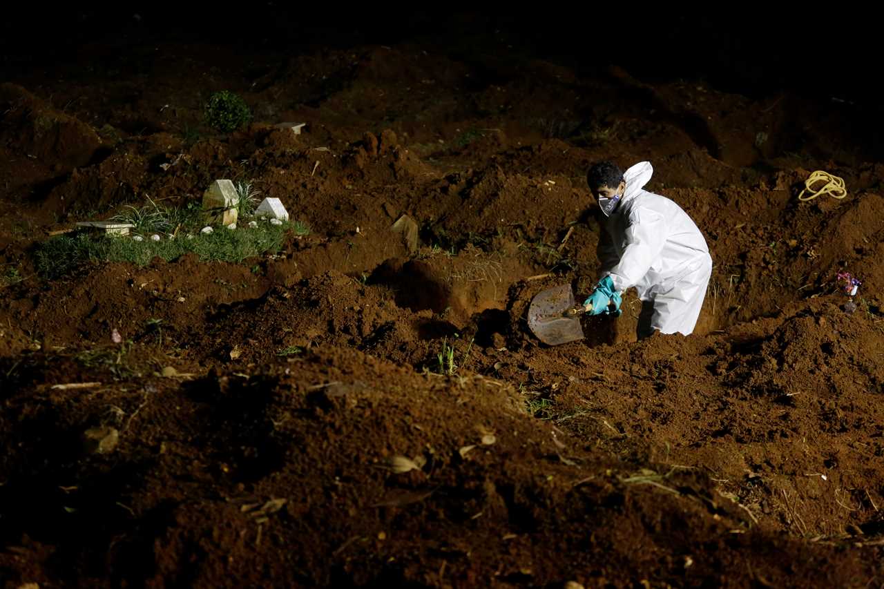 Overflowing Brazil cemetery digs up 1,000 skeletons to make room for more Covid victims as deaths spiral out of control