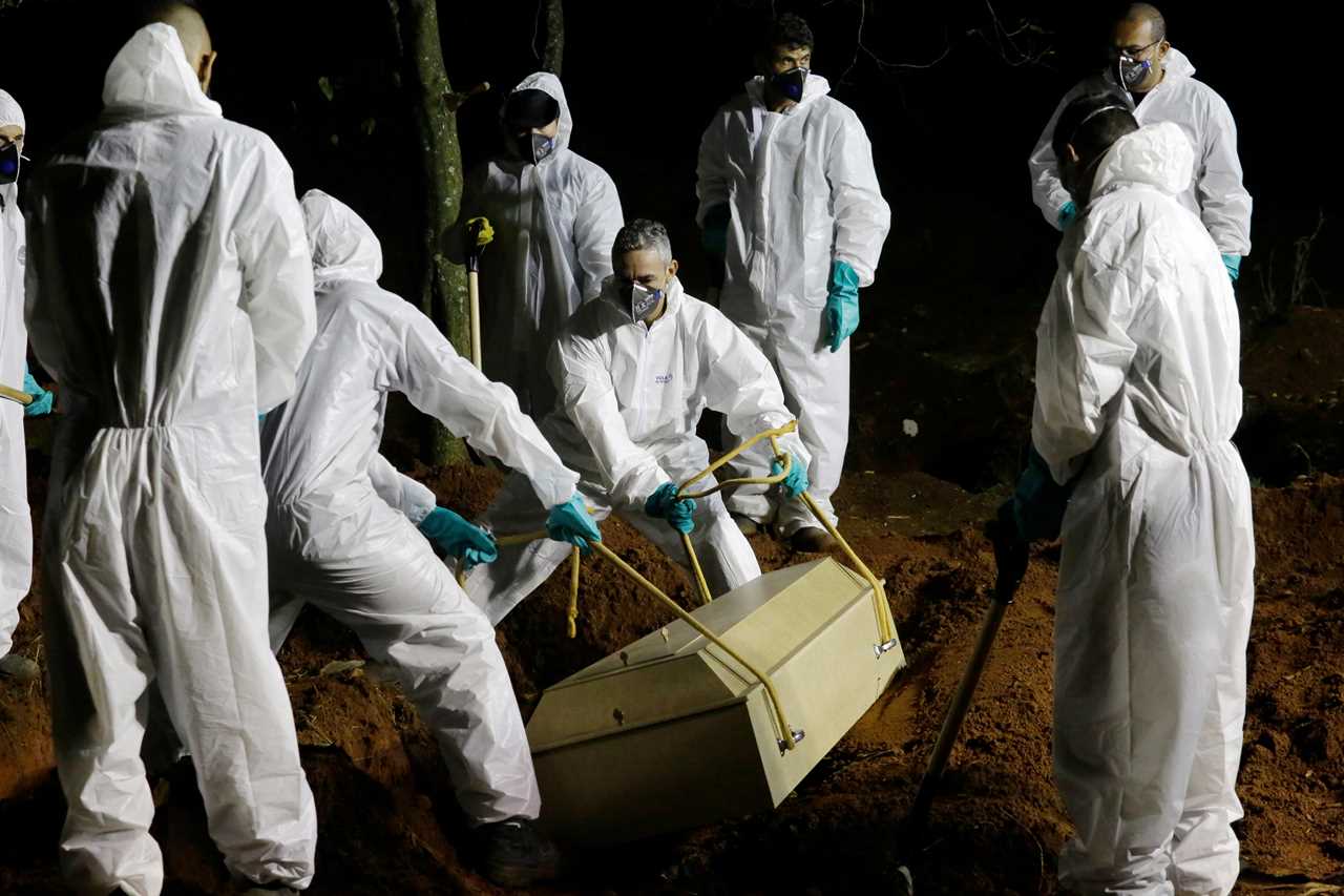 Overflowing Brazil cemetery digs up 1,000 skeletons to make room for more Covid victims as deaths spiral out of control