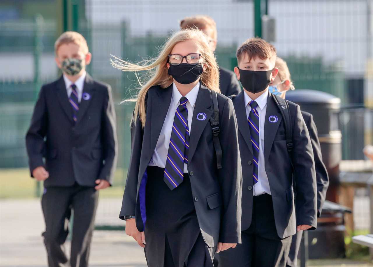 Kids MUST carry on wearing masks in classroom or risk third wave of Covid in schools, warn unions