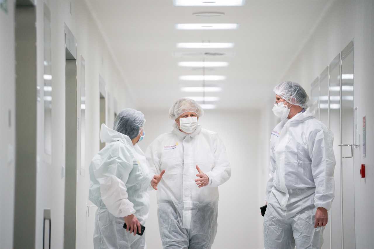 Boris Johnson takes forensic look at AstraZeneca vaccine in jab lab visit