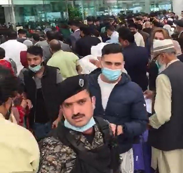 Chaotic scenes unfold at Islamabad Airport as hundreds desperately rush to reach UK before 4am deadline