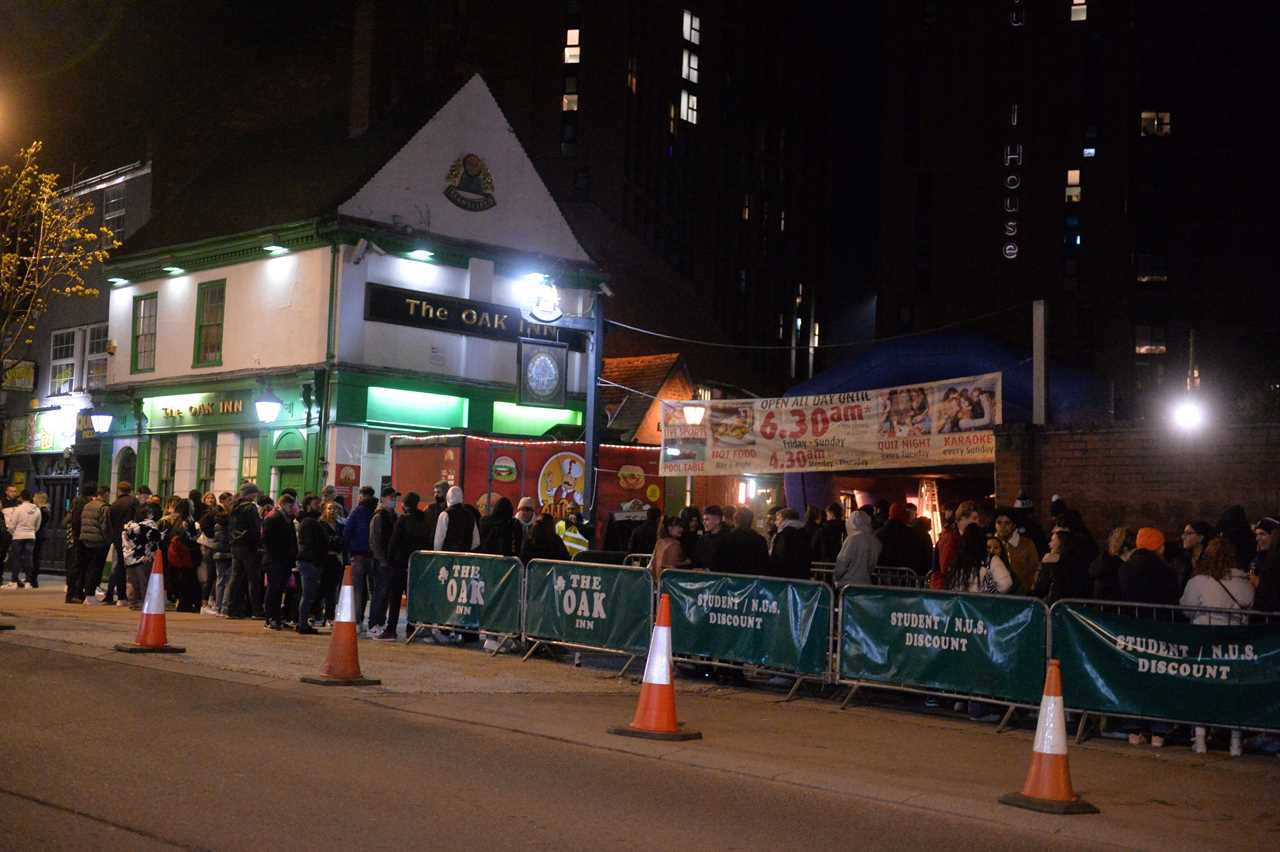 Joy as pubs in England reopen with punters queuing up to get their first pints in months