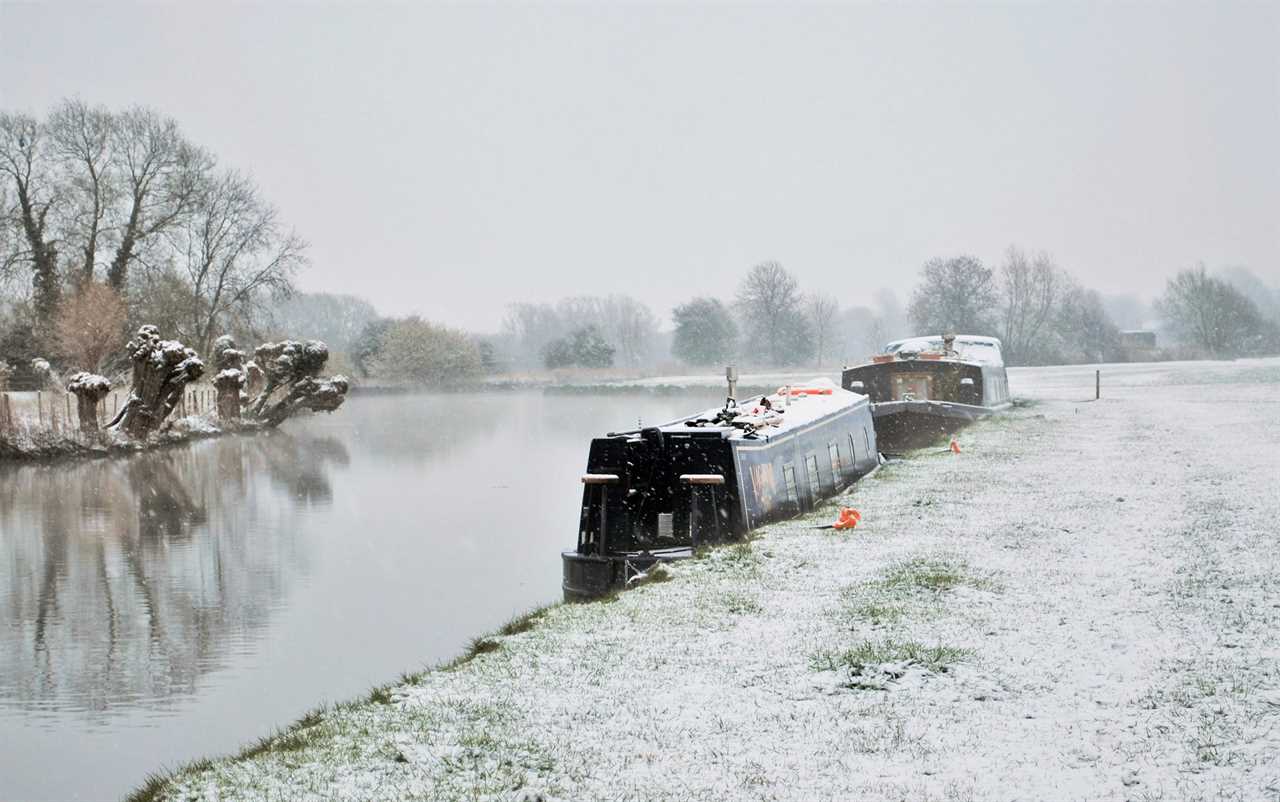 Thirsty Brits brave SNOW & queue from midnight in -3C temperatures as pub beer gardens reopen for first time in months