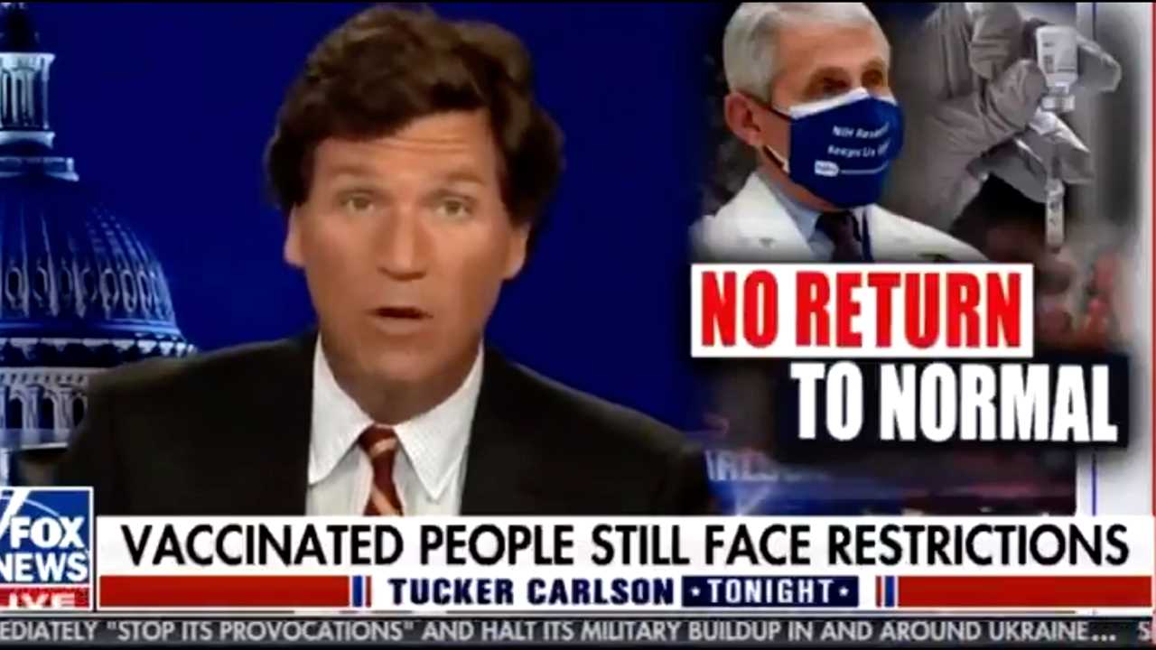 Tucker Carlson slams Dr Fauci and Justin Trudeau for saying vaccinated STILL have to wear masks