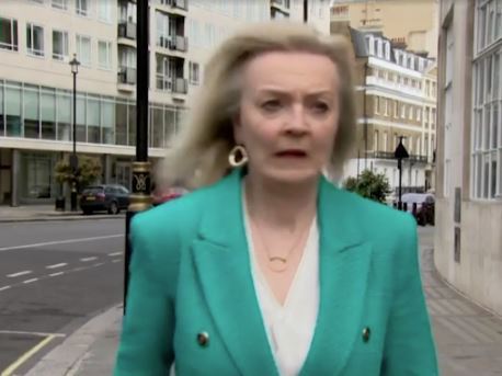 Moment Trade Secretary Liz Truss almost hit on head by falling tripod during live Sky TV interview