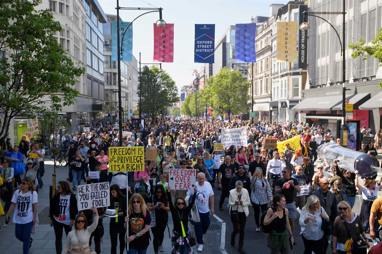 Thousands gather for anti-lockdown protest in London – despite pubs, shops and gyms reopening