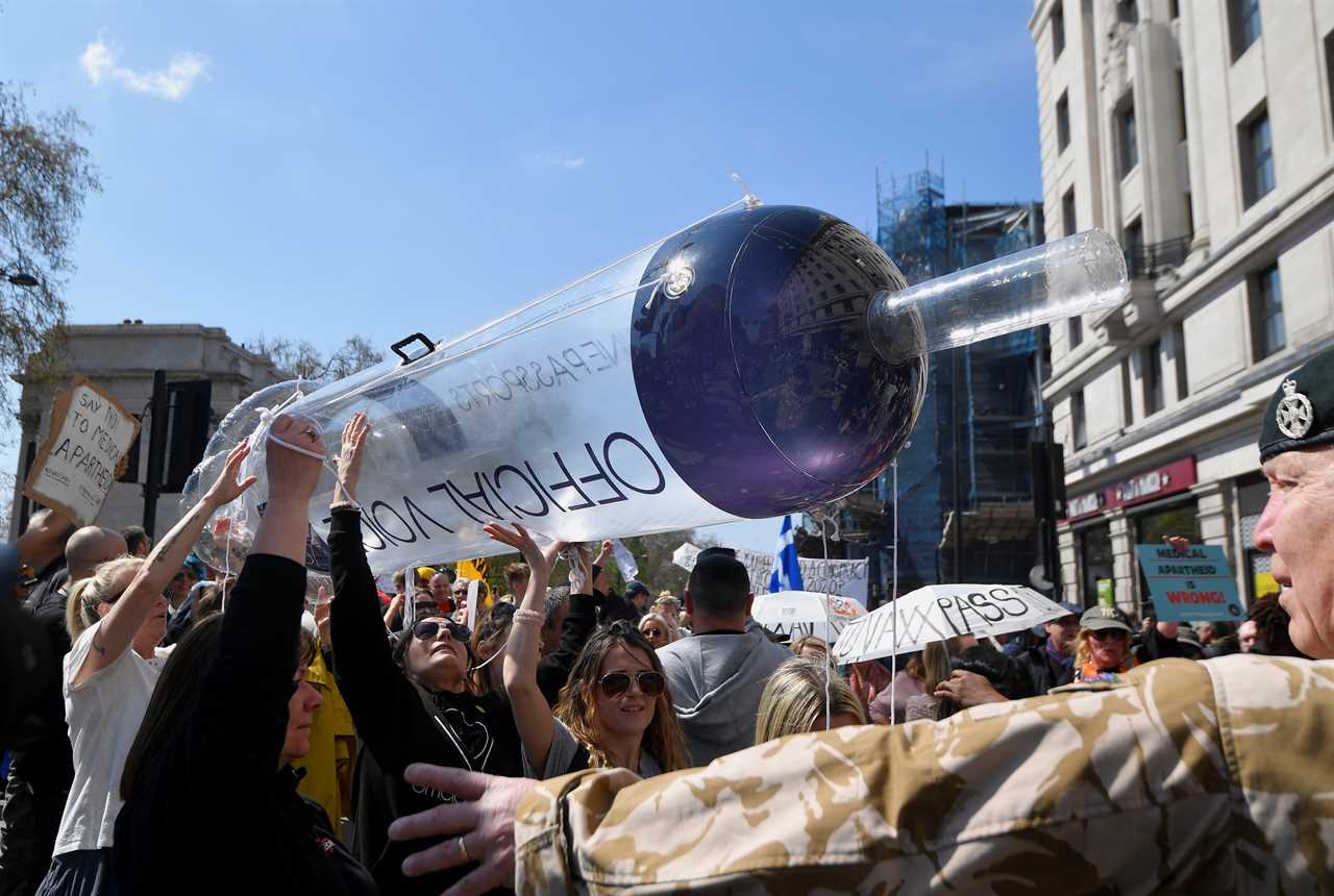 Thousands gather for anti-lockdown protest in London – despite pubs, shops and gyms reopening