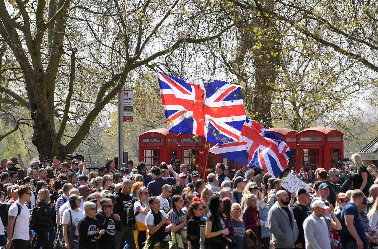 Thousands gather for anti-lockdown protest in London – despite pubs, shops and gyms reopening