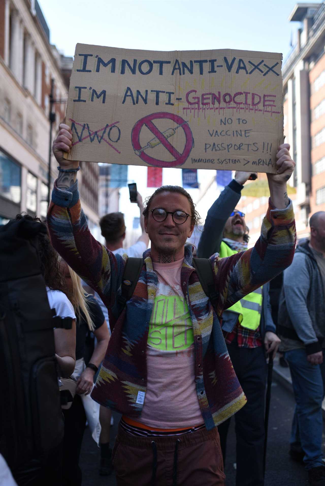 Thousands gather for anti-lockdown protest in London – despite pubs, shops and gyms reopening