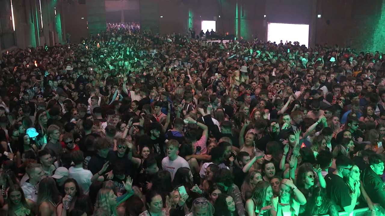 Thousands of excited Brits arrive for second post-lockdown rave with no social distancing or face masks at test event