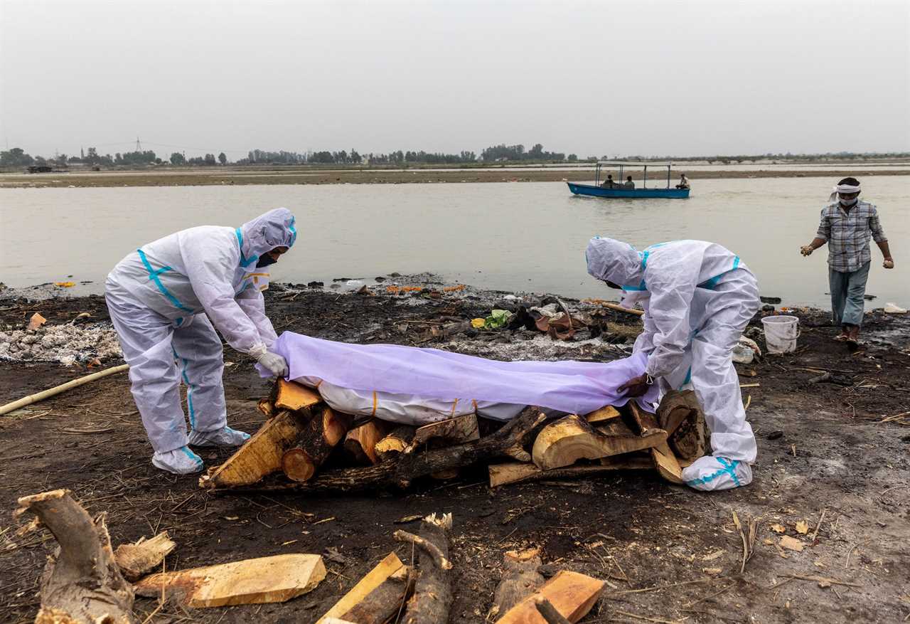 Dozens of ‘Covid-infected’ bodies found floating in Ganges river in India as ‘super spreader’ festivals STILL go ahead