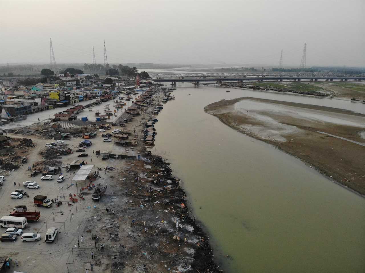 Dozens of ‘Covid-infected’ bodies found floating in Ganges river in India as ‘super spreader’ festivals STILL go ahead