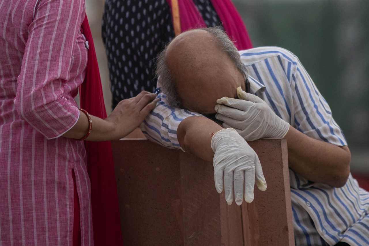 Dozens of ‘Covid-infected’ bodies found floating in Ganges river in India as ‘super spreader’ festivals STILL go ahead