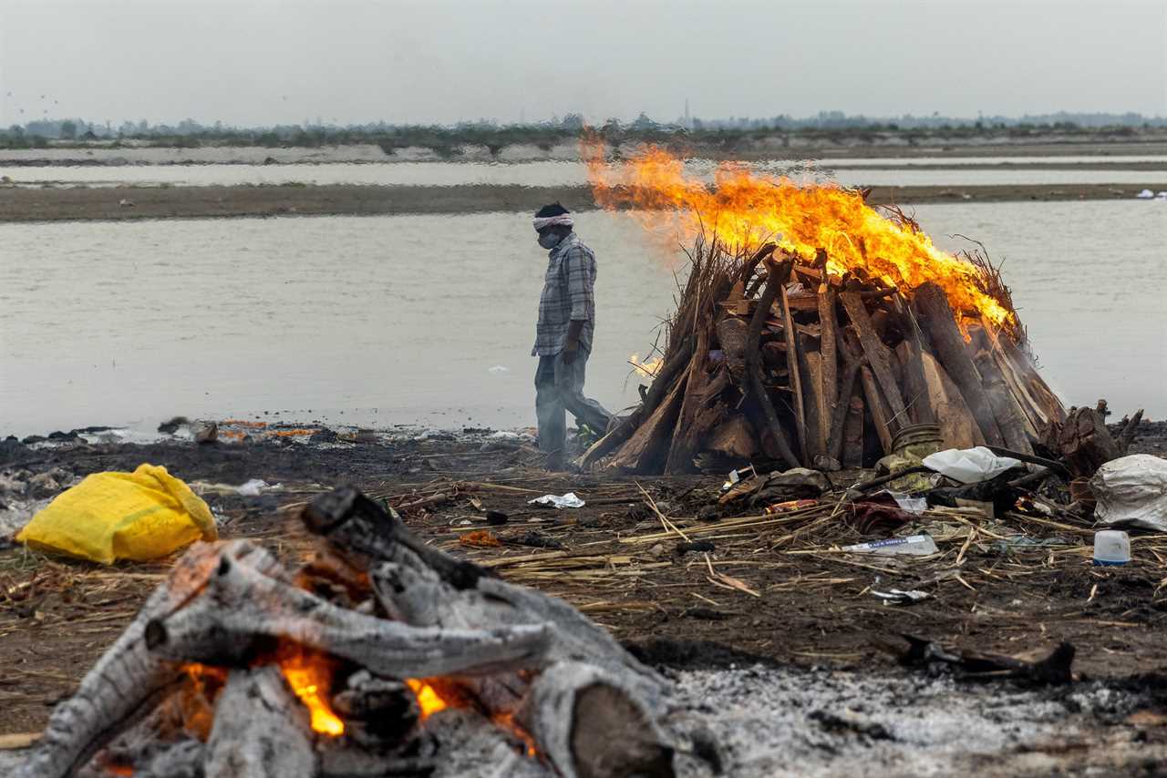 Dozens of ‘Covid-infected’ bodies found floating in Ganges river in India as ‘super spreader’ festivals STILL go ahead