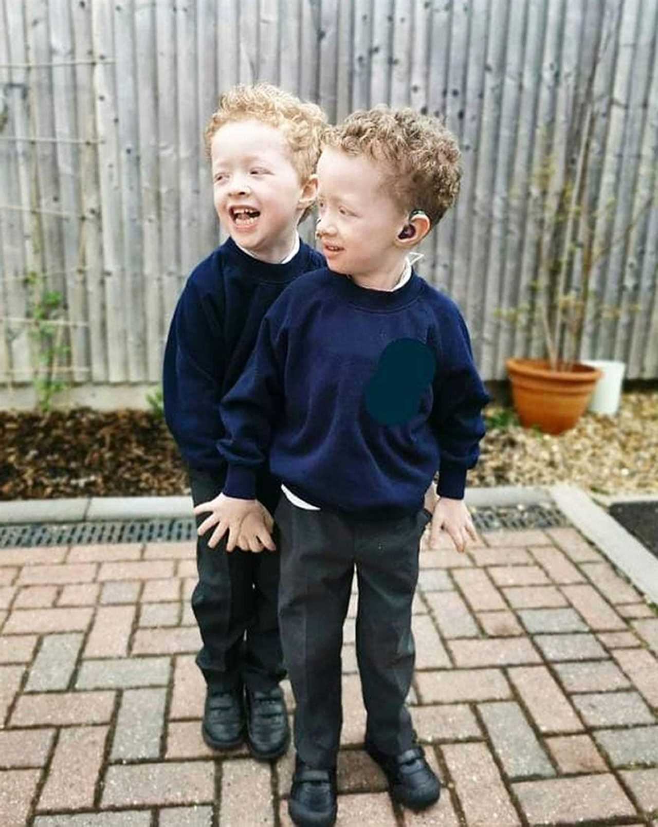 Brave five-year-old boy who overcame Covid and rare cancer spends first day at school with twin brother