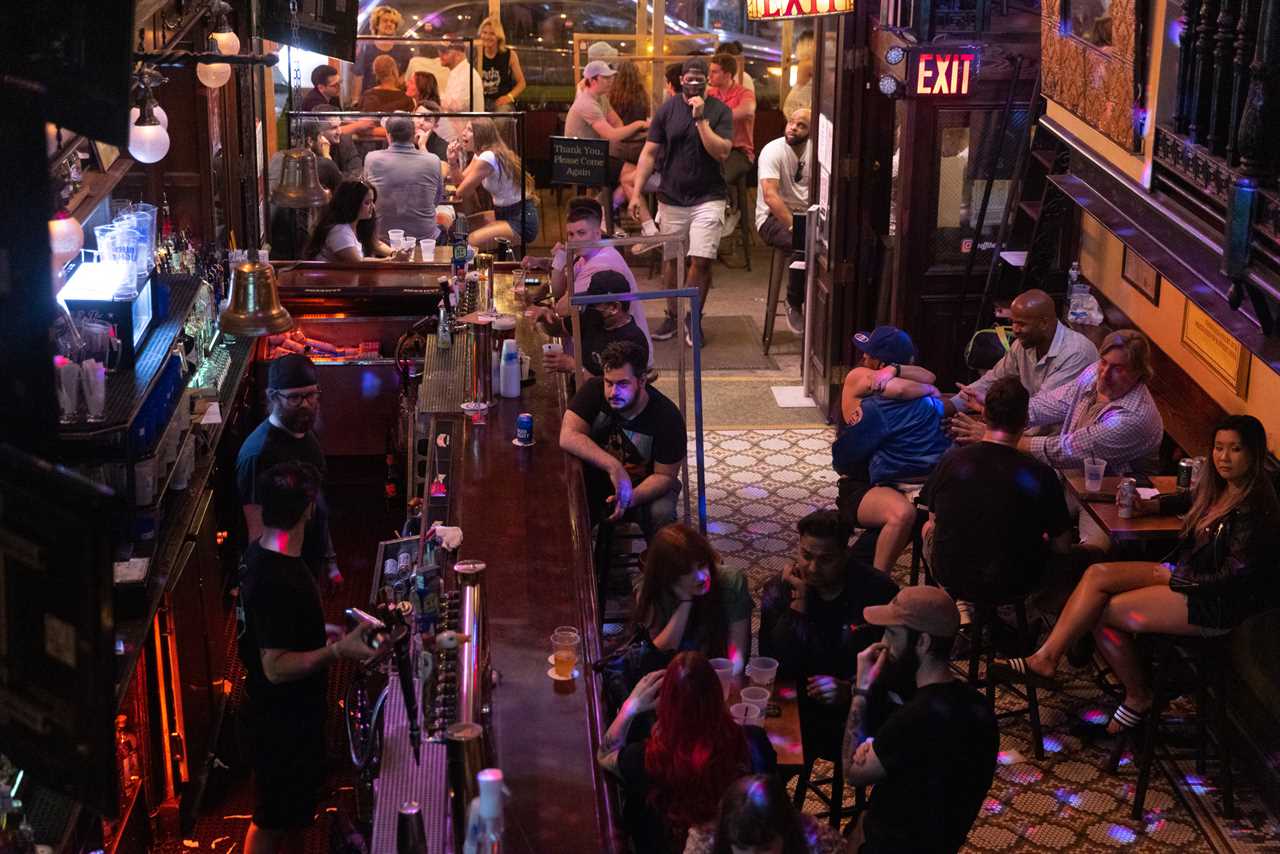 New York roars back to life as city’s bars and restaurants fully reopen and temperatures soar