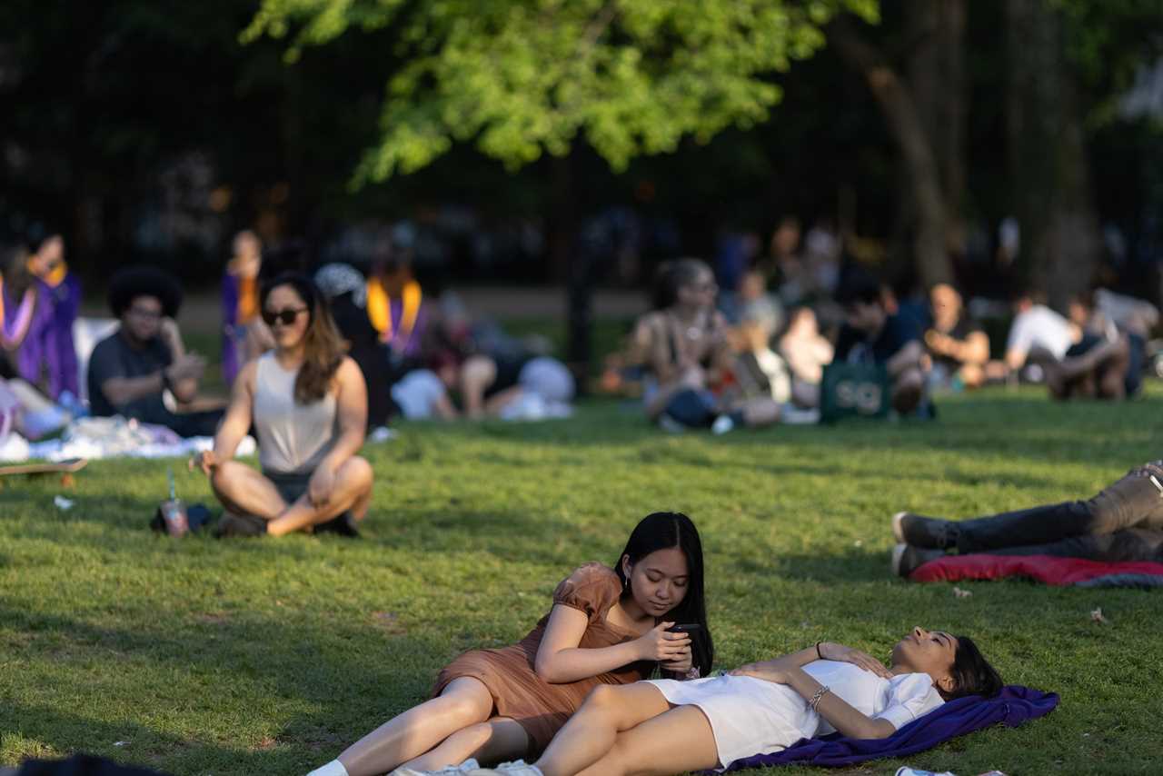 New York roars back to life as city’s bars and restaurants fully reopen and temperatures soar