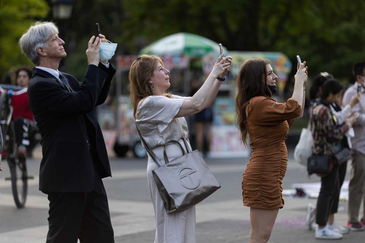 New York roars back to life as city’s bars and restaurants fully reopen and temperatures soar