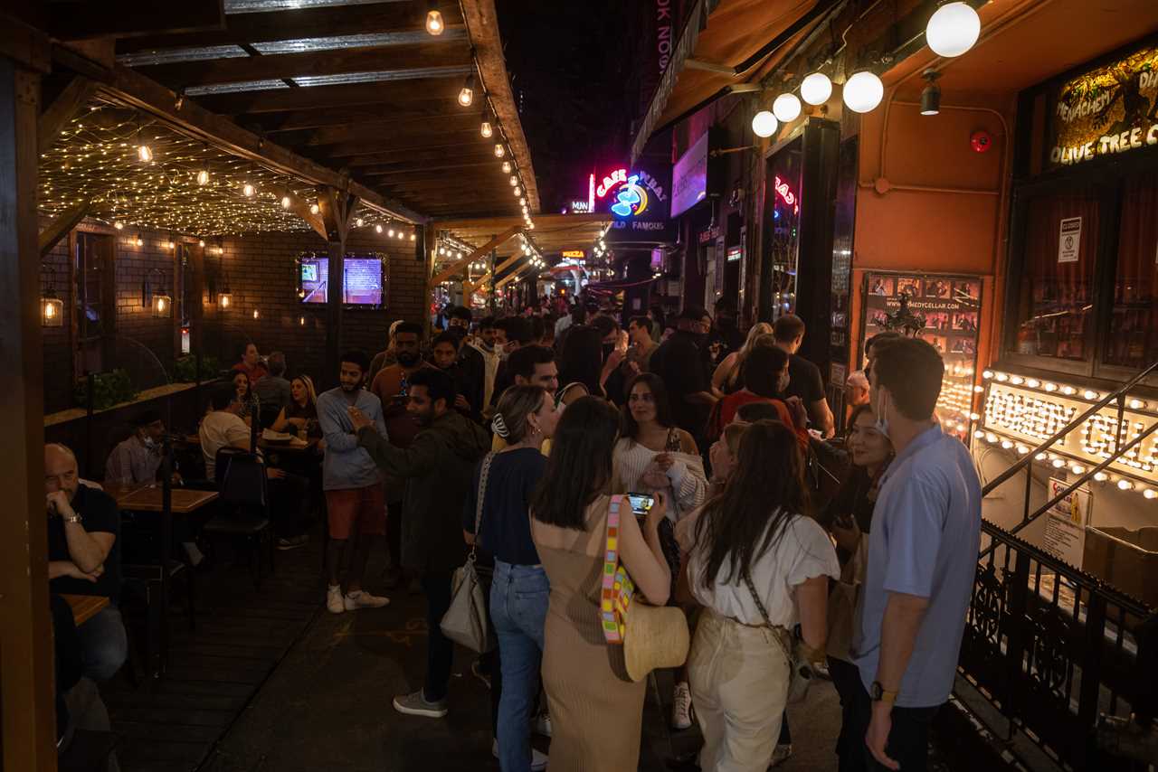 New York roars back to life as city’s bars and restaurants fully reopen and temperatures soar