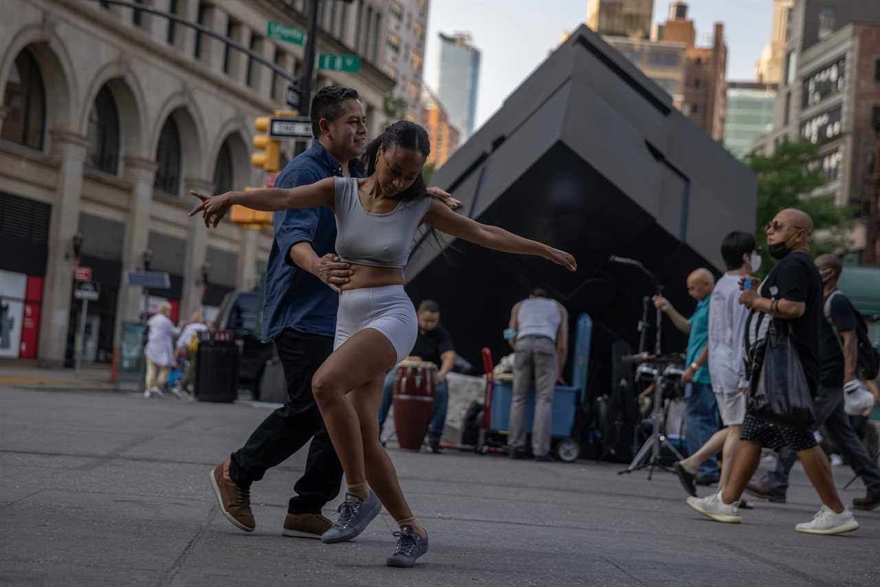 New York roars back to life as city’s bars and restaurants fully reopen and temperatures soar