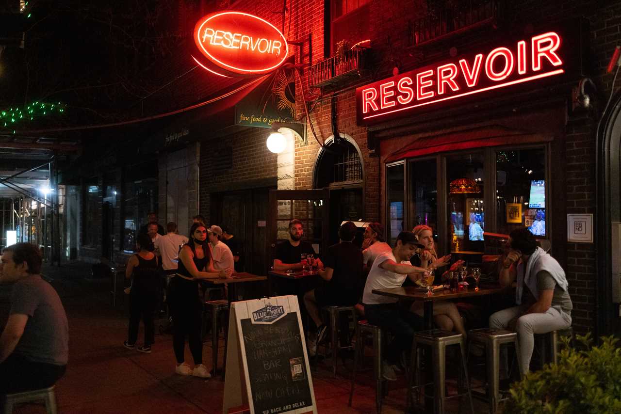 New York roars back to life as city’s bars and restaurants fully reopen and temperatures soar