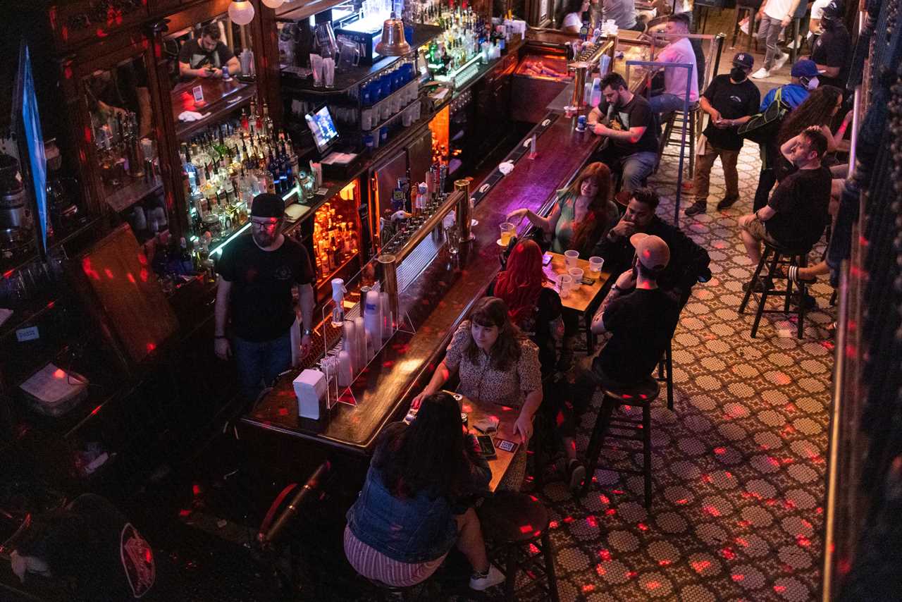 New York roars back to life as city’s bars and restaurants fully reopen and temperatures soar