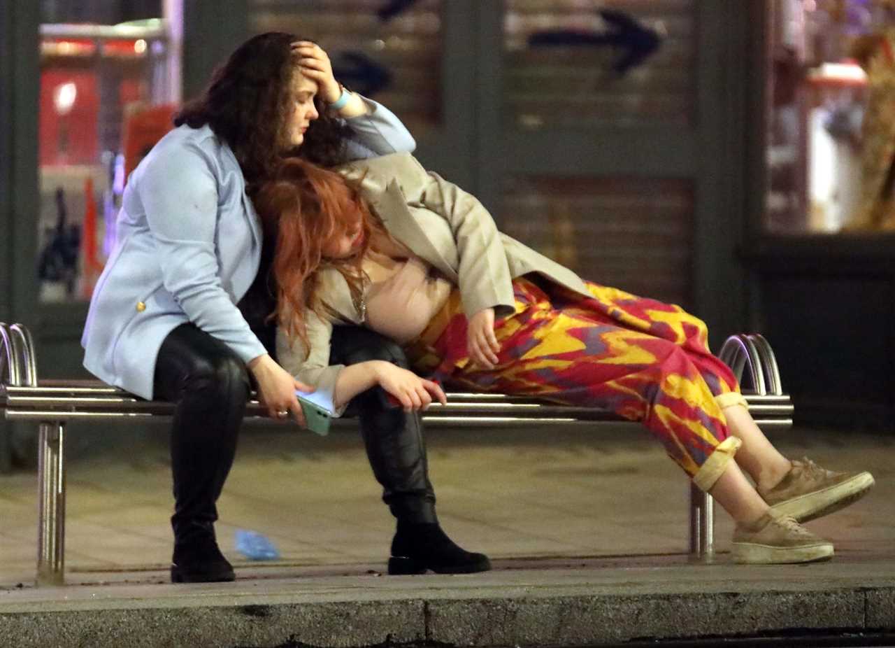 Bank Holiday: Booze-fuelled revellers hit the town for Friday night fun as weekend begins with a bang