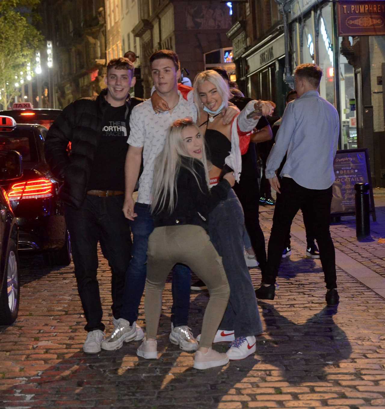 Bank Holiday: Booze-fuelled revellers hit the town for Friday night fun as weekend begins with a bang