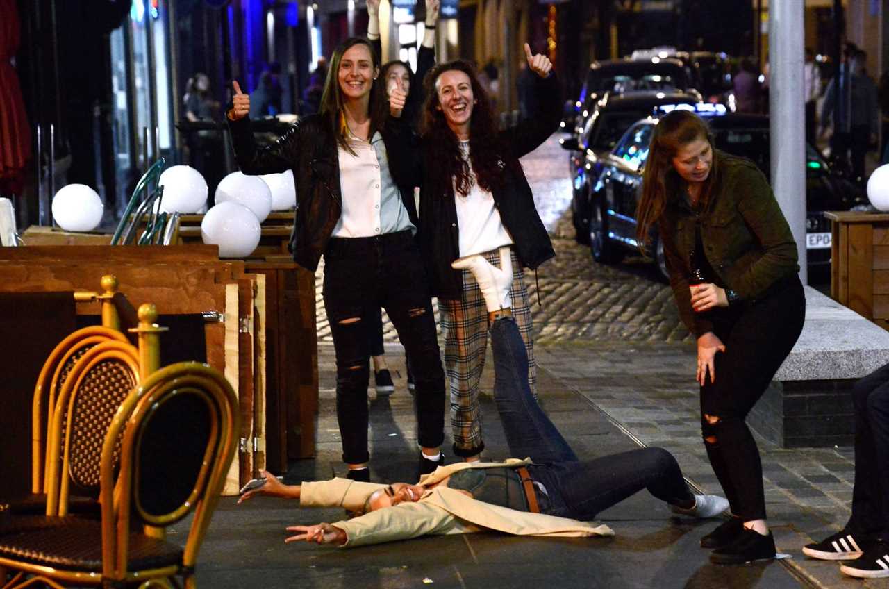 Bank Holiday: Booze-fuelled revellers hit the town for Friday night fun as weekend begins with a bang