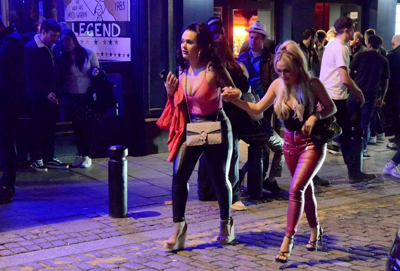 Bank Holiday: Booze-fuelled revellers hit the town for Friday night fun as weekend begins with a bang