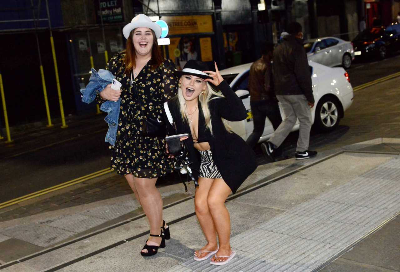 Bank Holiday: Booze-fuelled revellers hit the town for Friday night fun as weekend begins with a bang