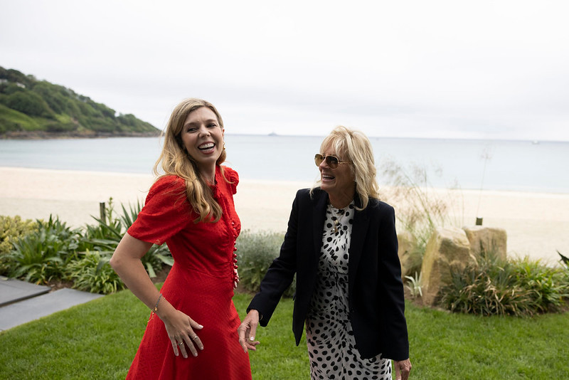 Carrie Symonds plays with son Wilfred as she joins Jill Biden on beach walk